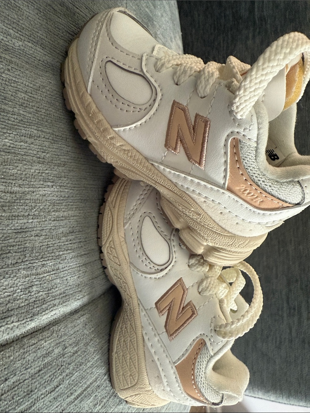 New Balance Kids Cream and Rose Gold Accent Sneakers
